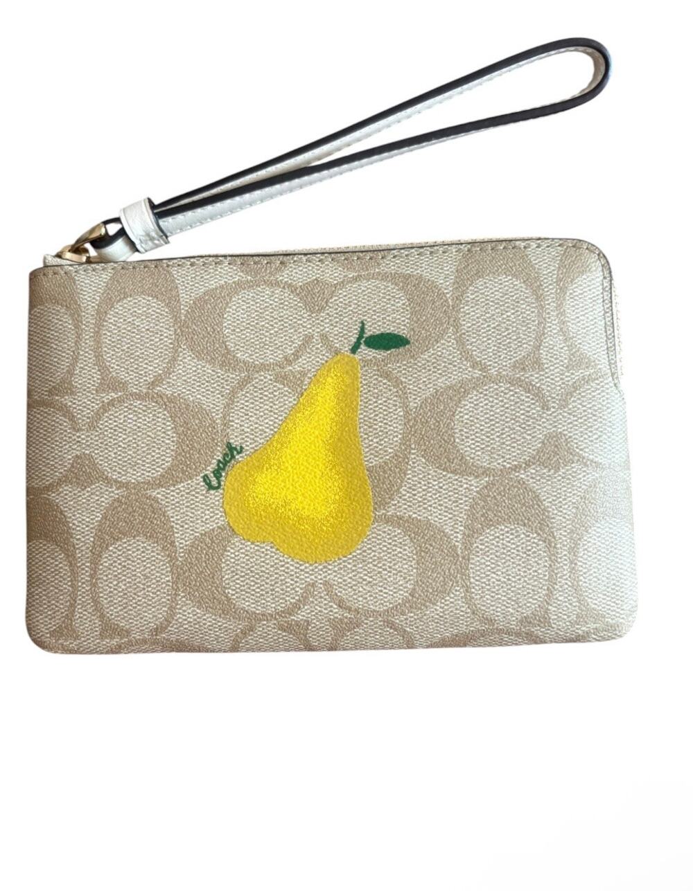 NWT coach wristlet with pear and cc print on coated canvas